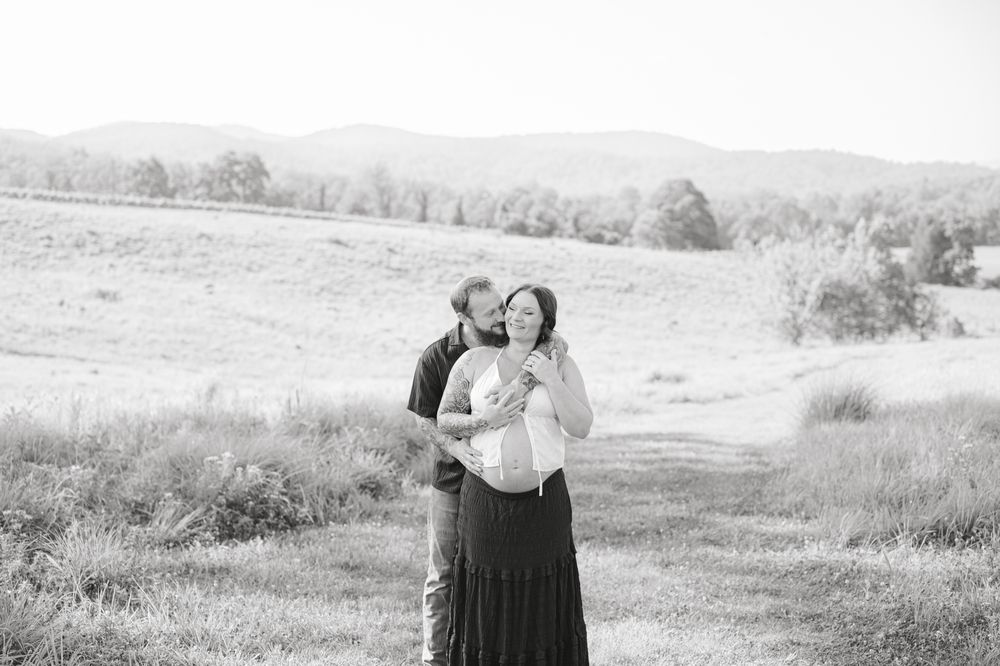 Outdoor maternity photography session in Amherst, VA surrounded by natural beauty, capturing a mother-to-be’s connection, joy, and timeless