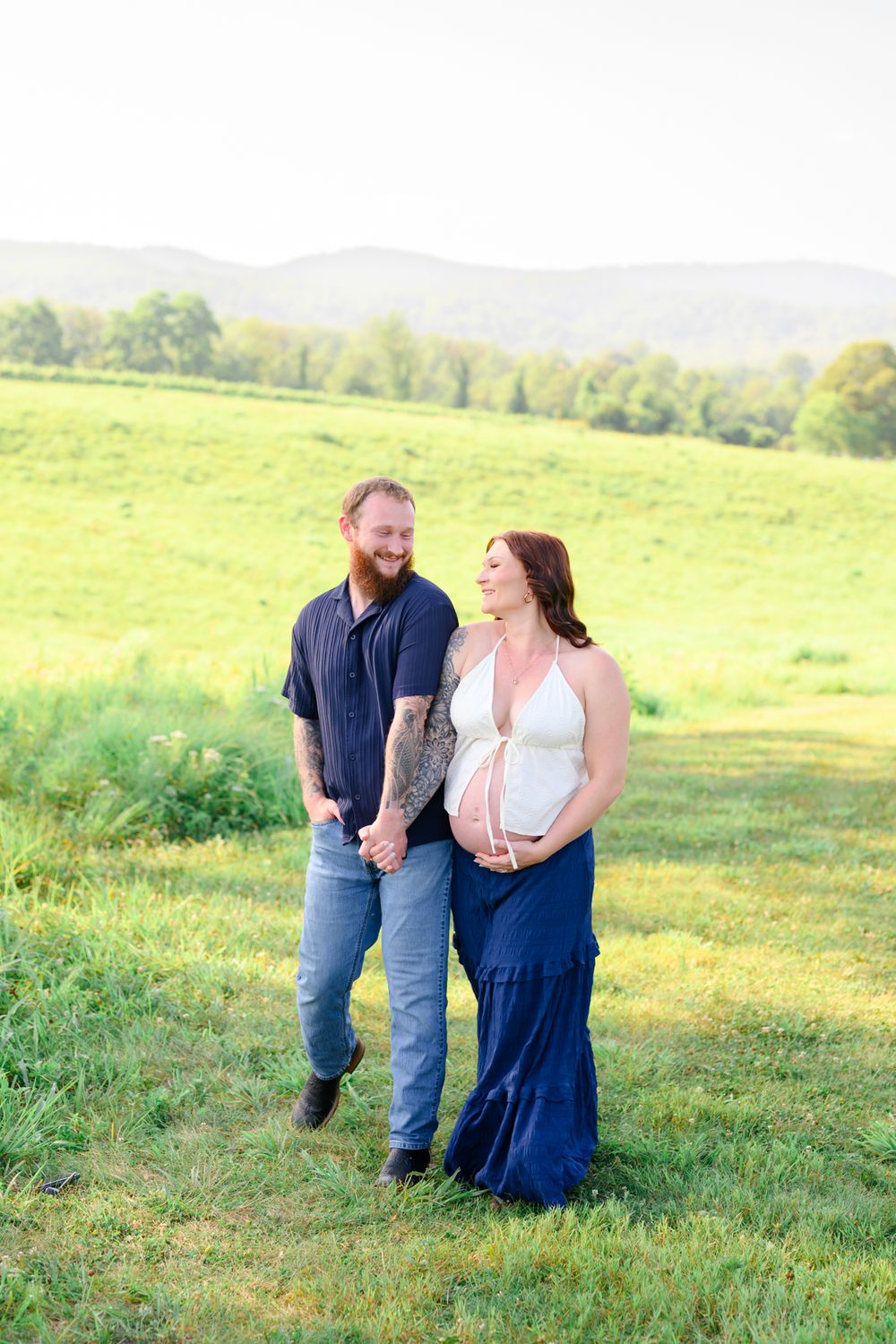 Outdoor maternity photography session in Amherst, VA surrounded by natural beauty, capturing a mother-to-be’s connection, joy, and timeless