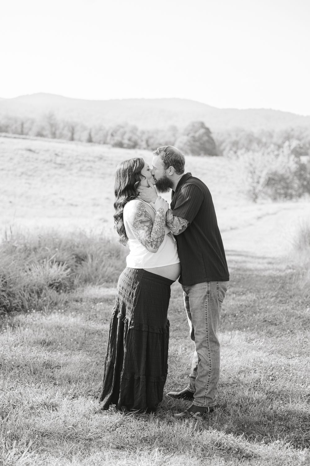 Outdoor maternity photography session in Amherst, VA surrounded by natural beauty, capturing a mother-to-be’s connection, joy, and timeless