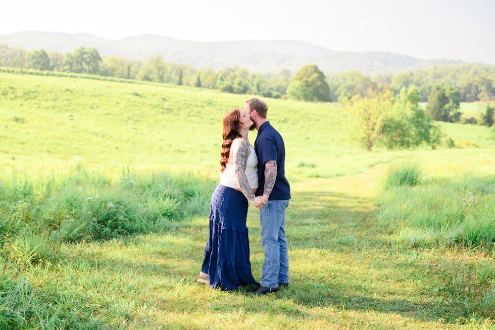 Outdoor maternity photography session in Amherst, VA surrounded by natural beauty, capturing a mother-to-be’s connection, joy, and timeless