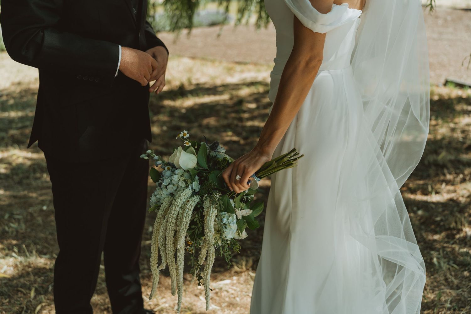 Candid wedding couple sharing a first look