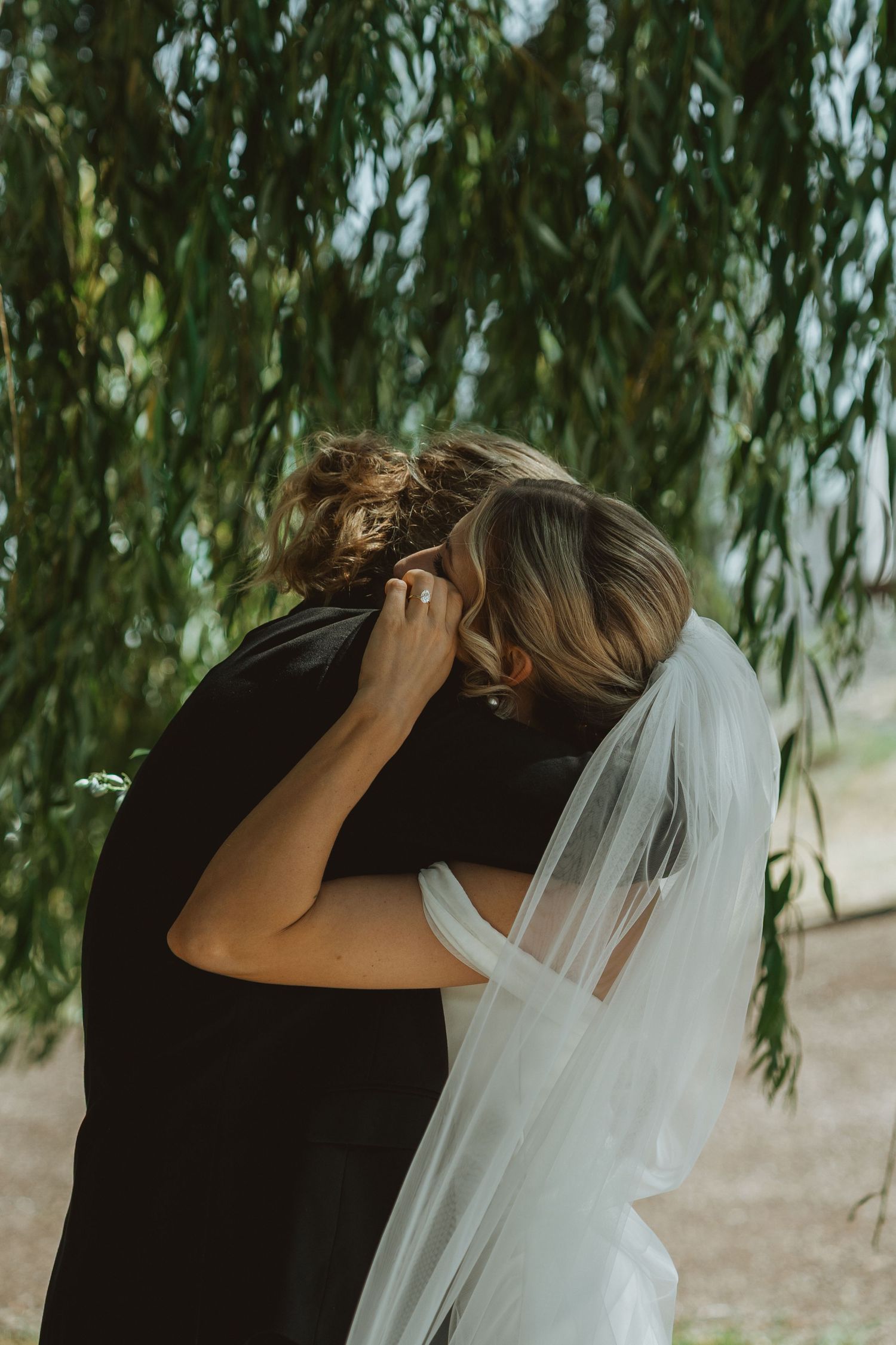 Bride and groom sharing an emotional first look