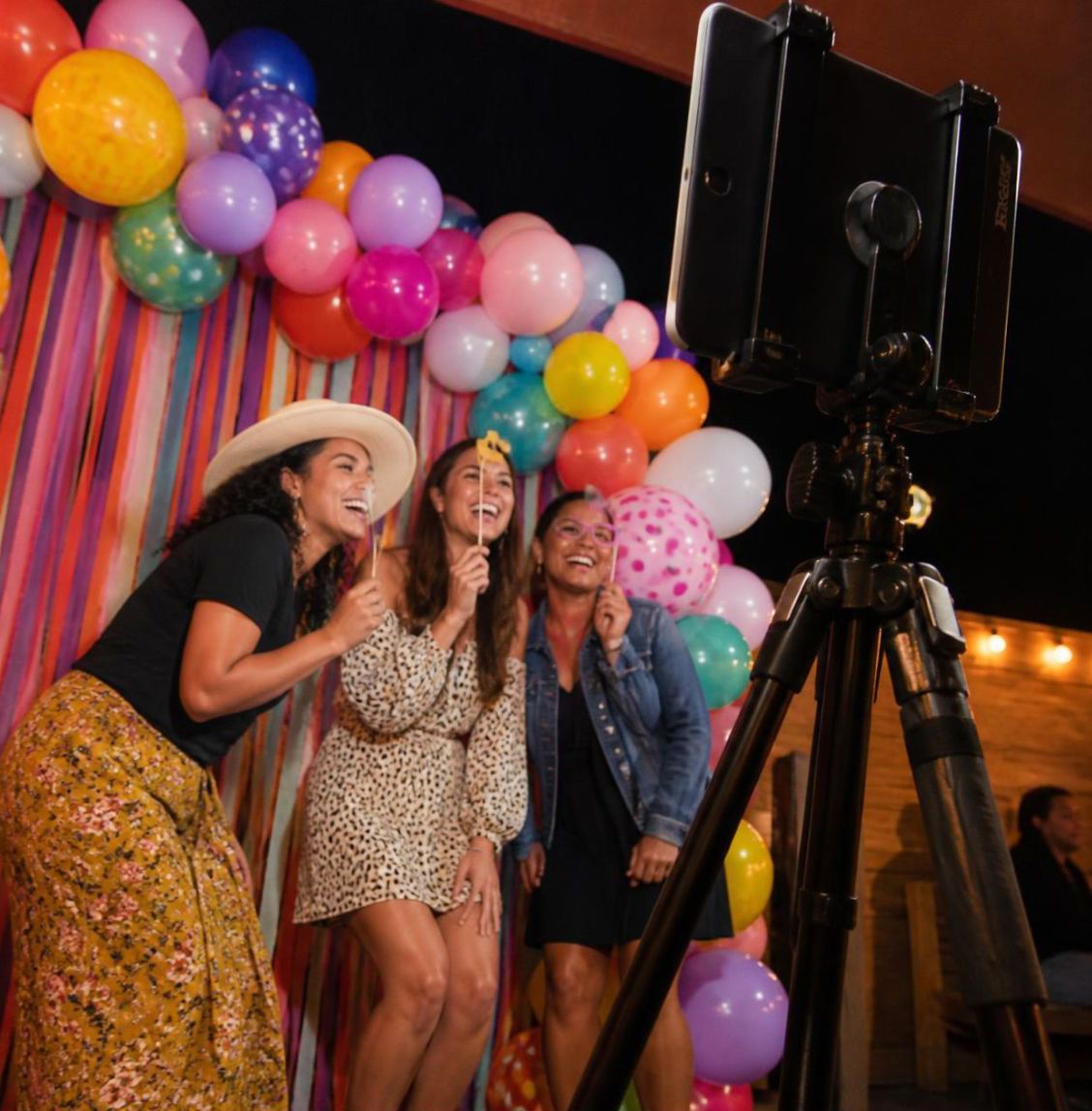 Quinceañera photo booth ideas for families on a budget using DIY backdrops, props and tablet setups instead of expensive booth rentals XV