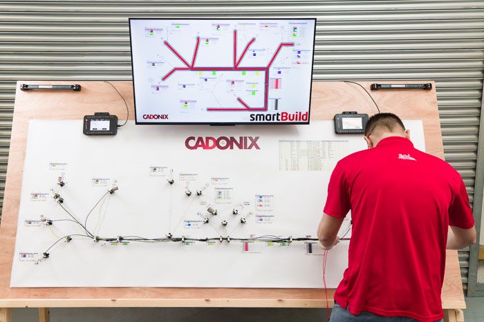 Engineer working on wiring harness design software at Cadonix, Oxford