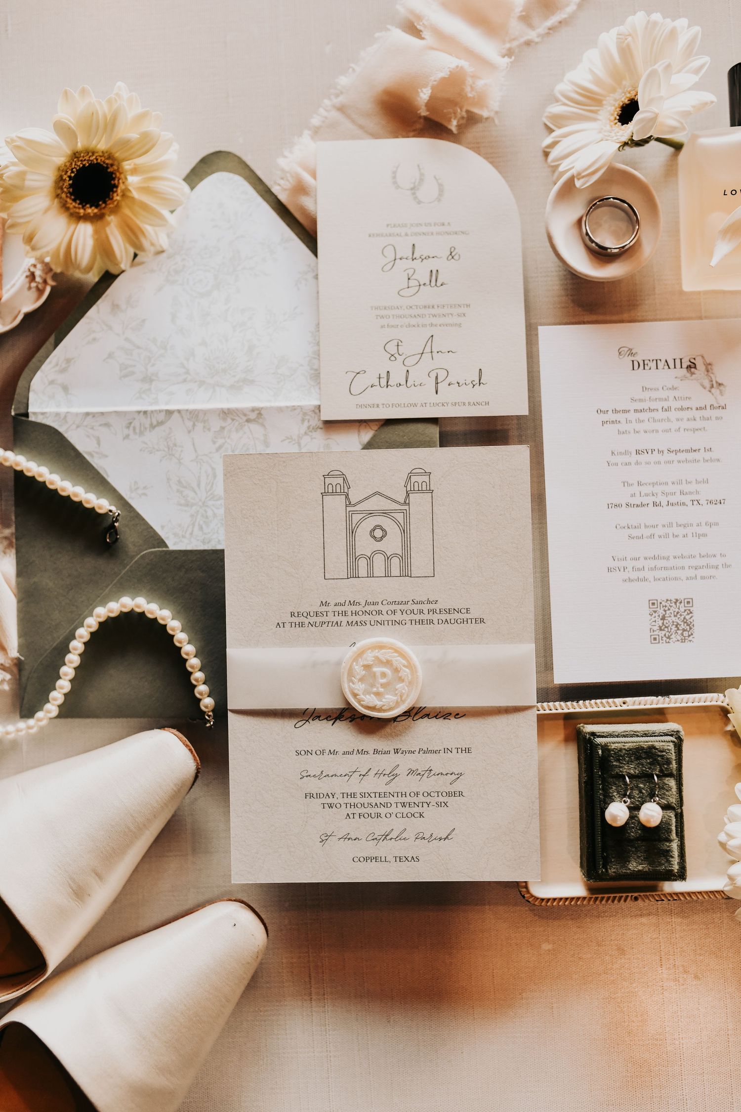 Editorial wedding detail flat lay with bride's jewelry and accessories