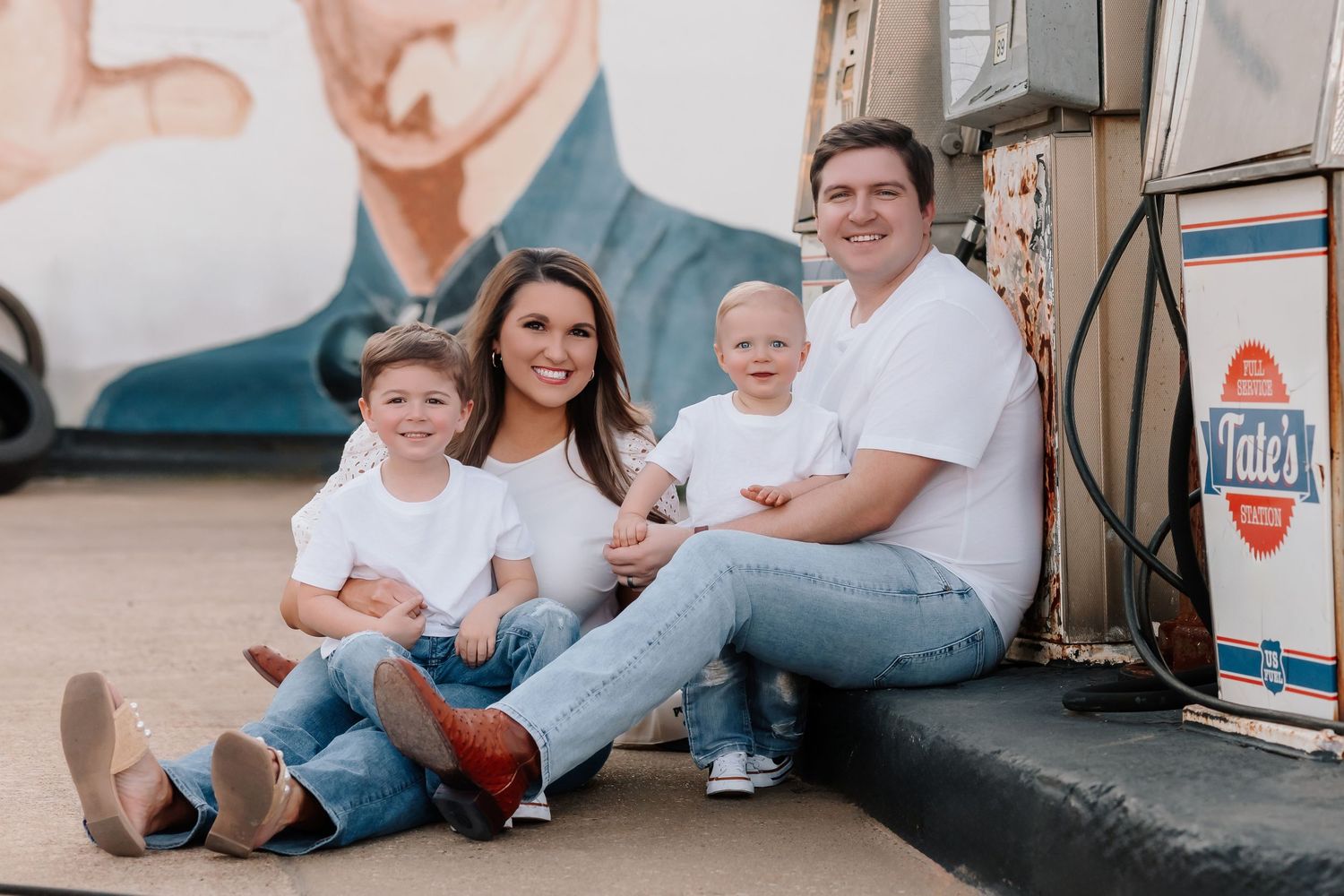 Lonoke Arkansas family during a Little Rascals themed 1 year old birthday session at Tate's Garage in Lonoke