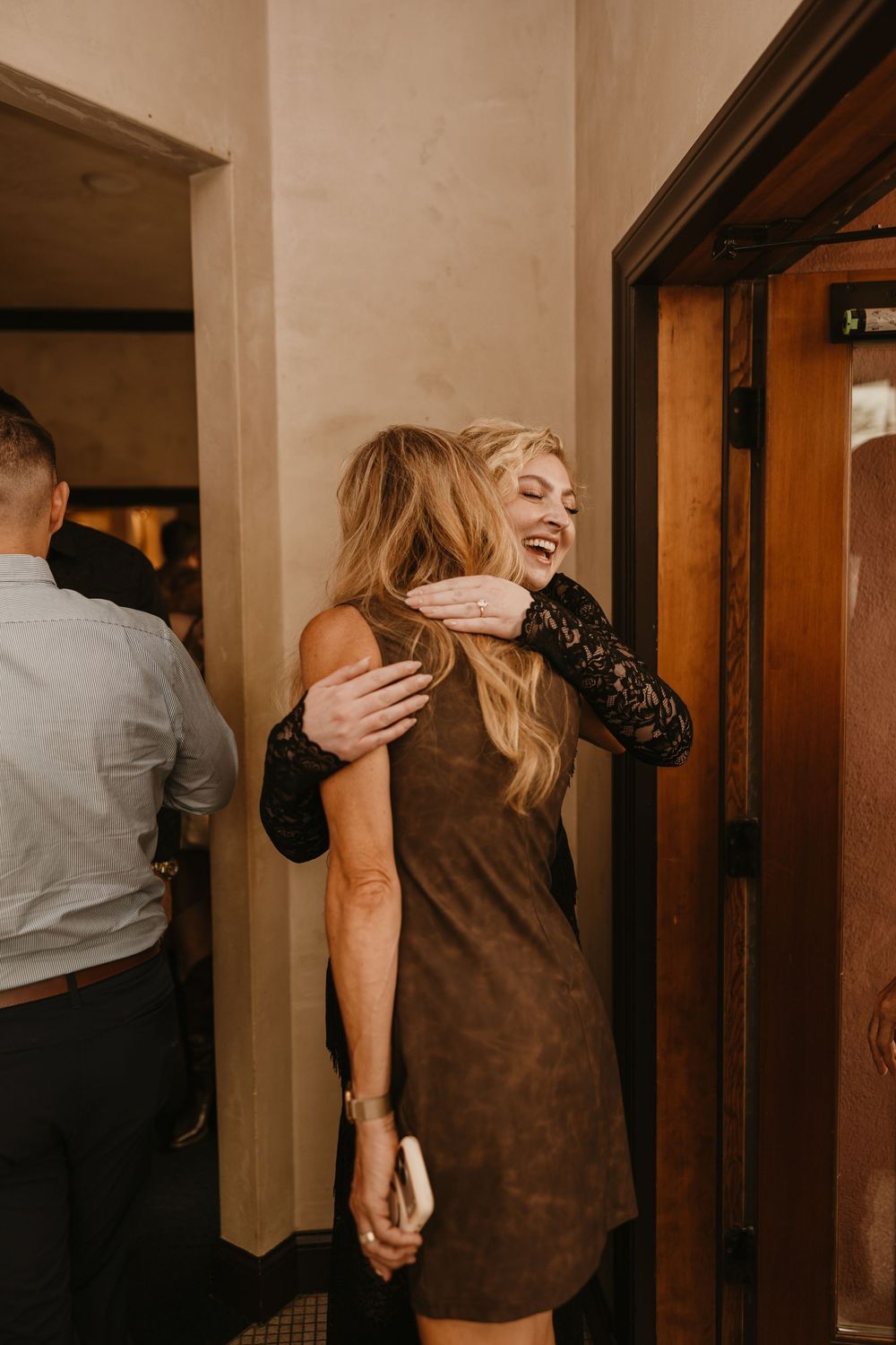 Wedding couple on their wedding welcome party on Murray Street in Paradise Valley captured by local Livingston Wedding Photographer