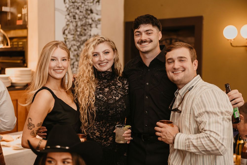 Wedding couple on their wedding welcome party on Murray Street in Paradise Valley captured by local Livingston Wedding Photographer