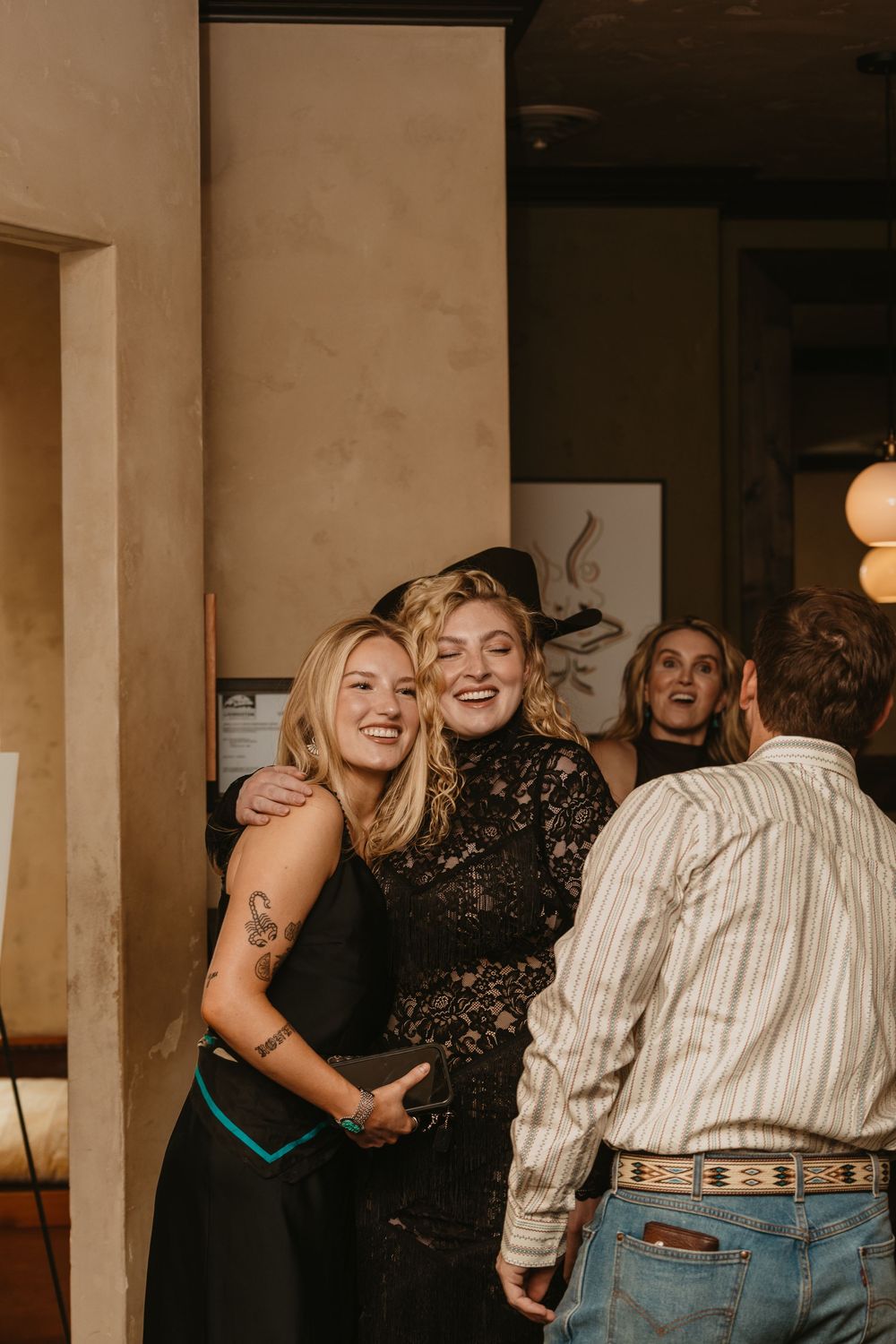 Wedding couple on their wedding welcome party on Murray Street in Paradise Valley captured by local Livingston Wedding Photographer