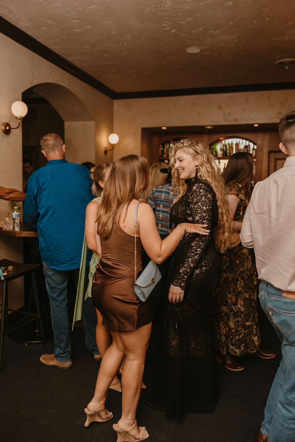 Wedding couple on their wedding welcome party on Murray Street in Paradise Valley captured by local Emigrant Wedding Photographer