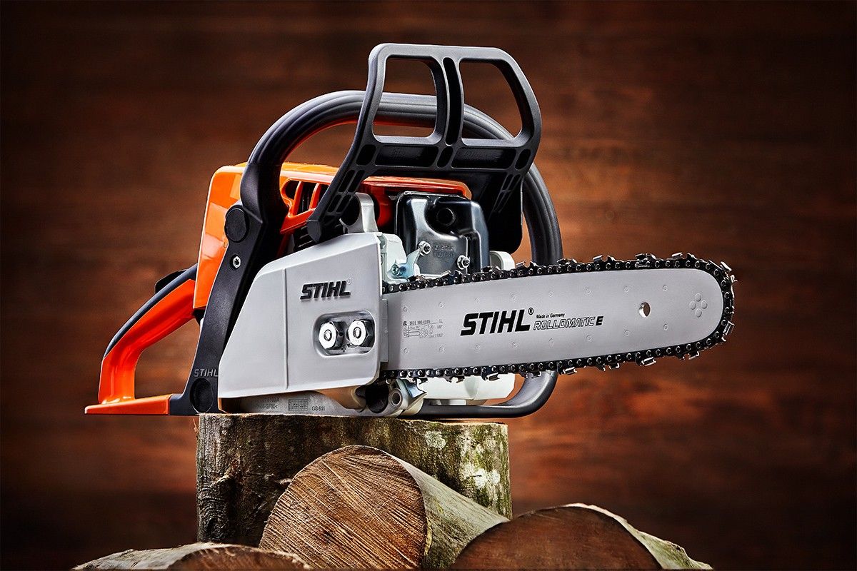 STIHL chainsaw product photography on a tree stump, photographed by RezinMedia