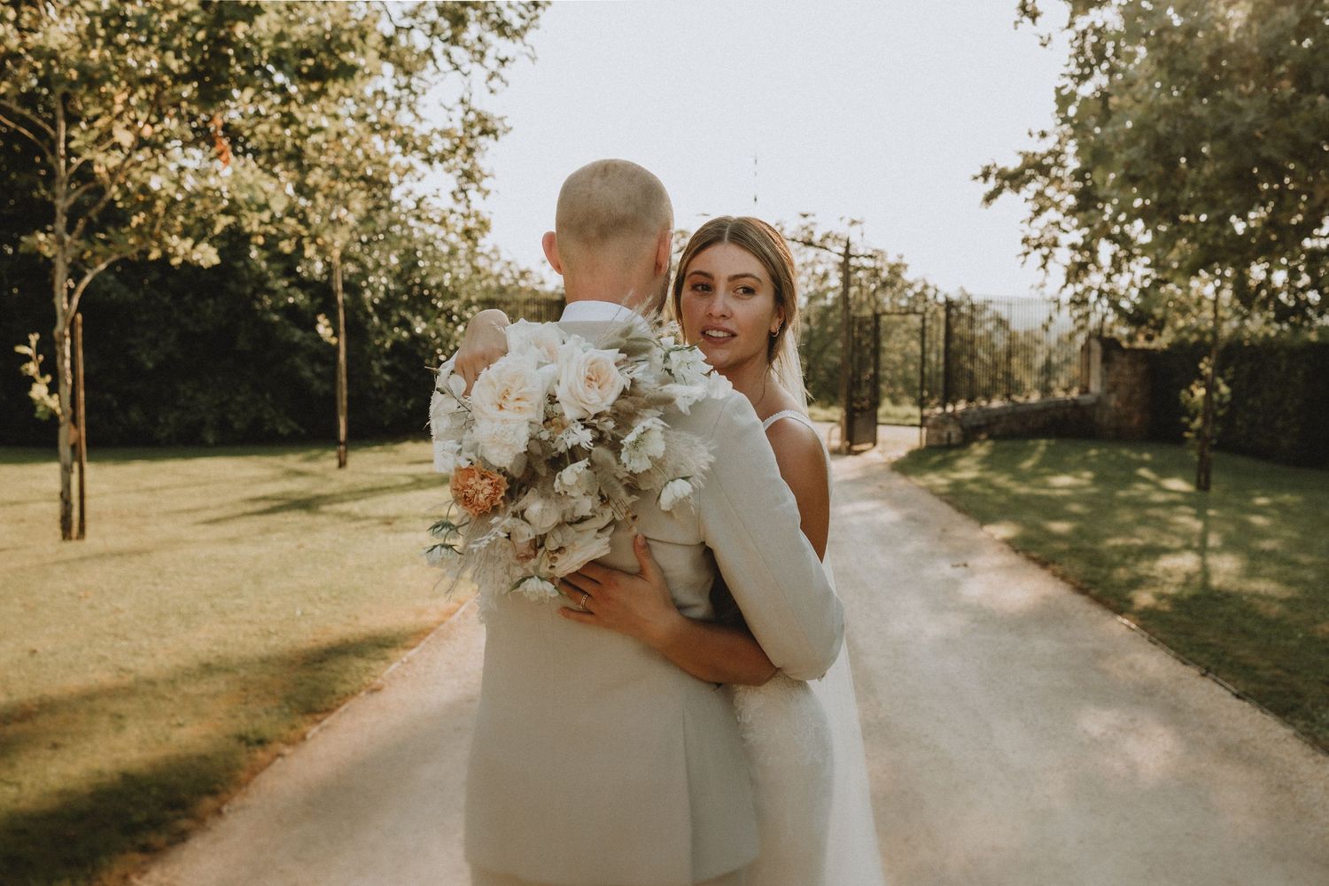 Emotional couple portrait by a destination wedding photographer in the heart of France.