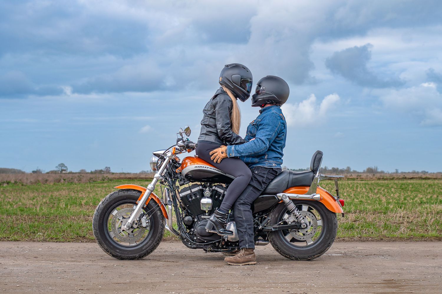 Engaged couple in love sitting on a motorcycle. Engagement photography, Rotherham, Sheffield, South Yorkshire, Leeds