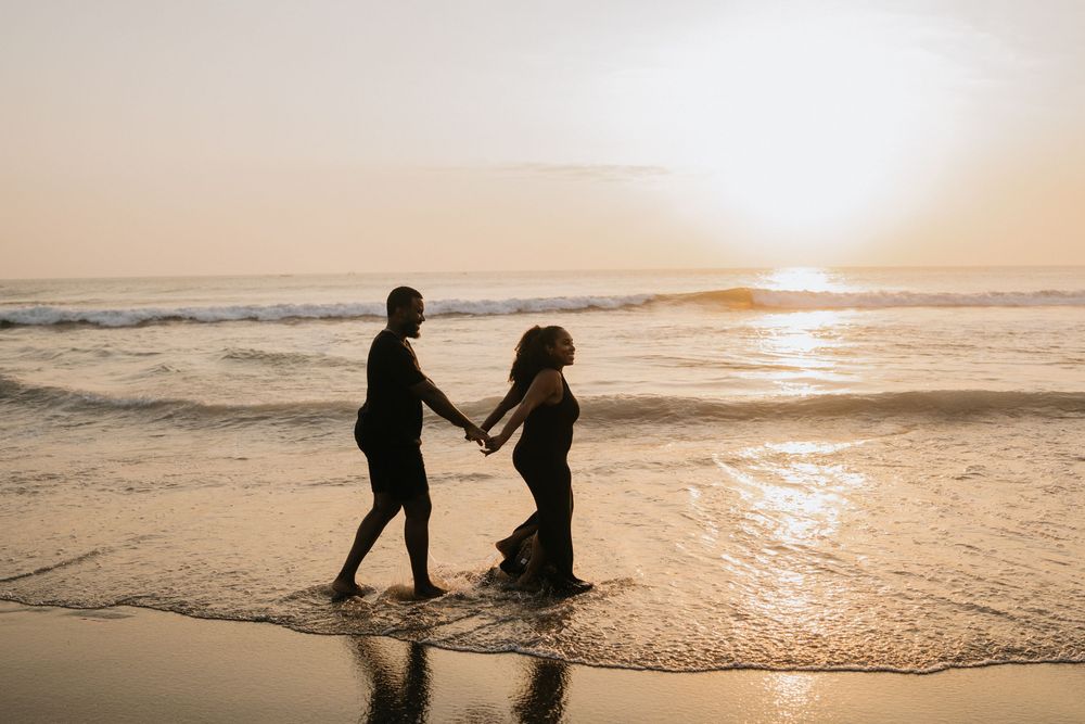 Romantic couple photoshoot on Seminyak Beach in Bali.