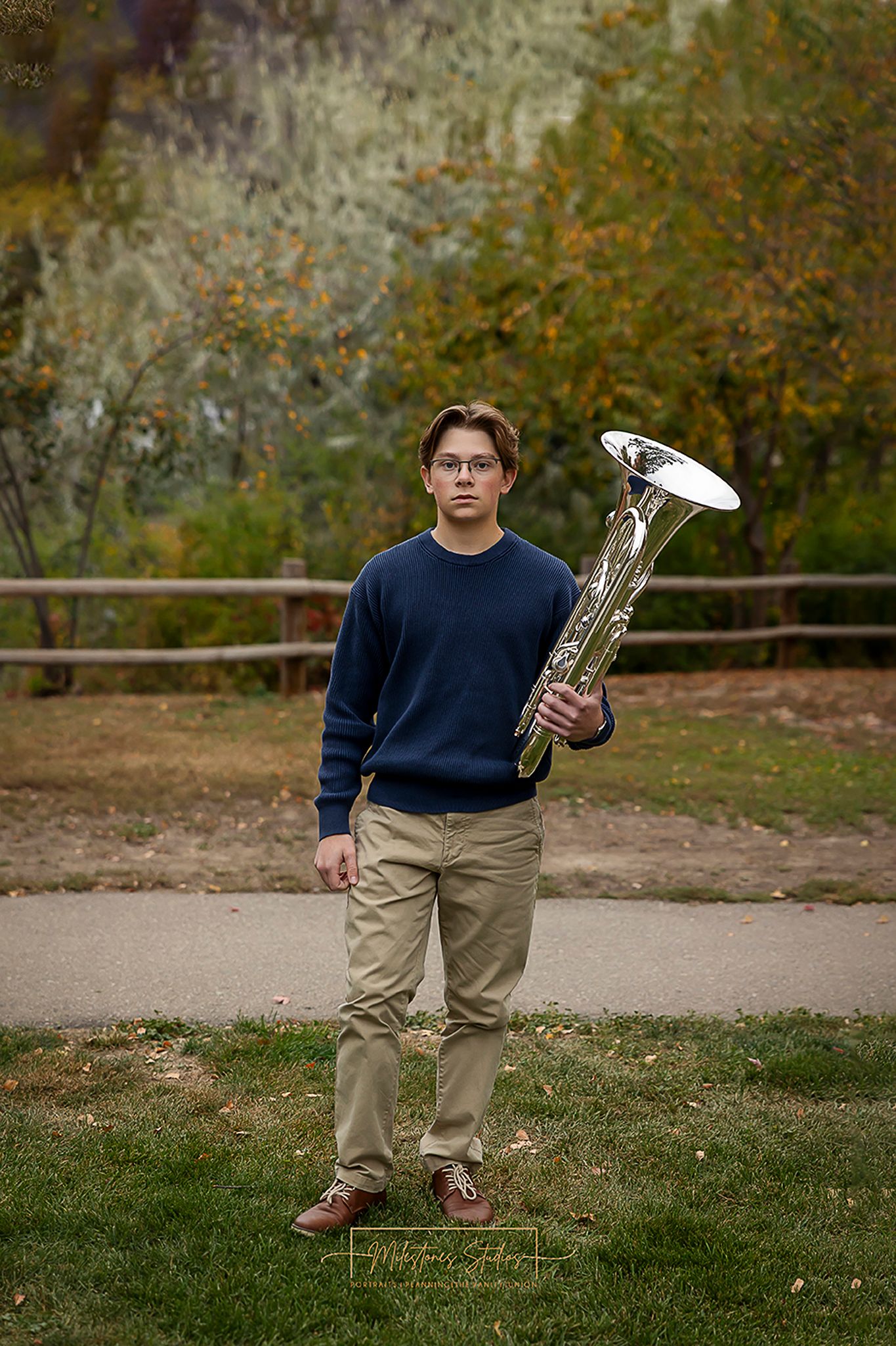 Senior portraits on the Boise River Greenbelt in Meridian, Idaho. Class of 2027 session with euphonium