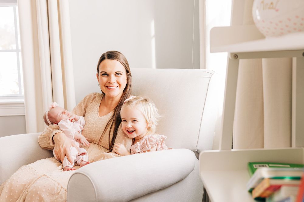Bright airy family photos in white and cream tones.