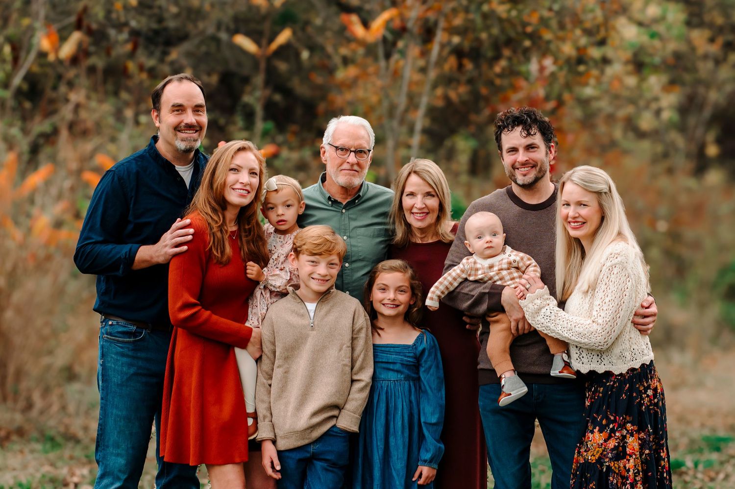 large Tulsa family in Jenks at Coal Creek Farm in the fall; family consists of a baby, 2 year old, twins, grandparents, adult children