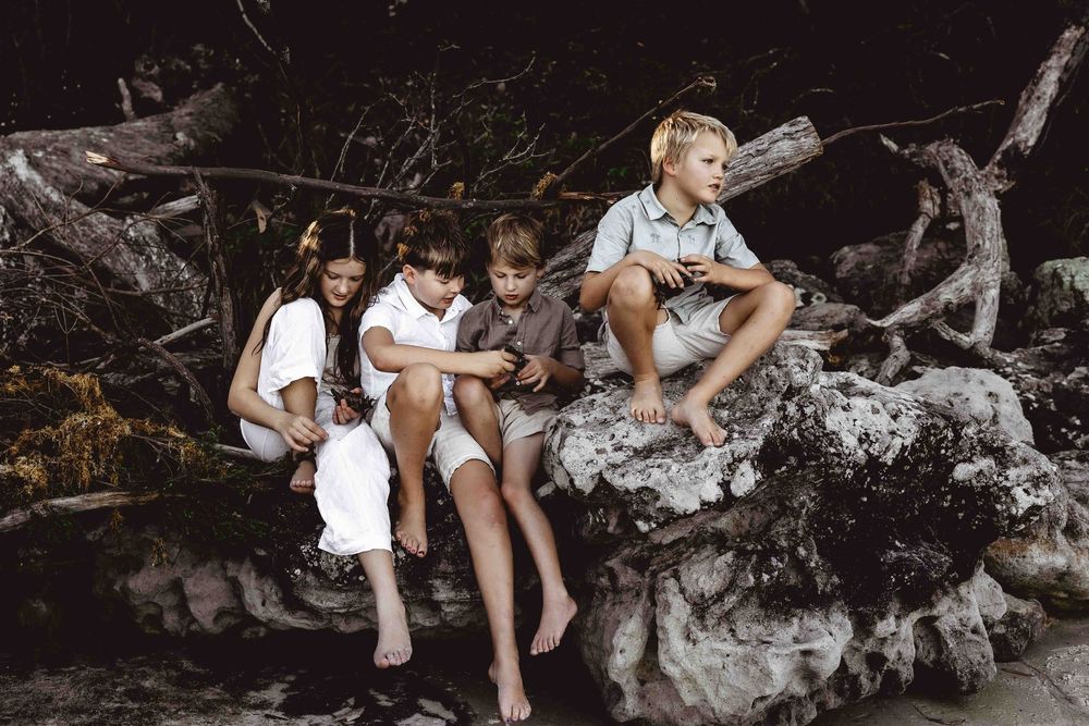 Family Photos Jervis Bay Shoalhaven. Kids Climbing on rocks Vincentia