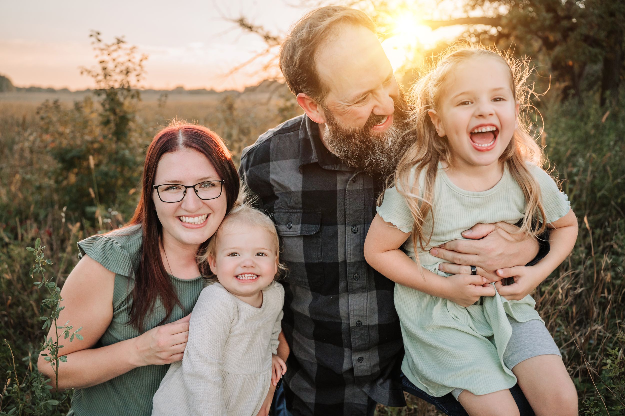 A series of candid outdoor family photos at sunset showing joyful moments and laughter among loved ones.