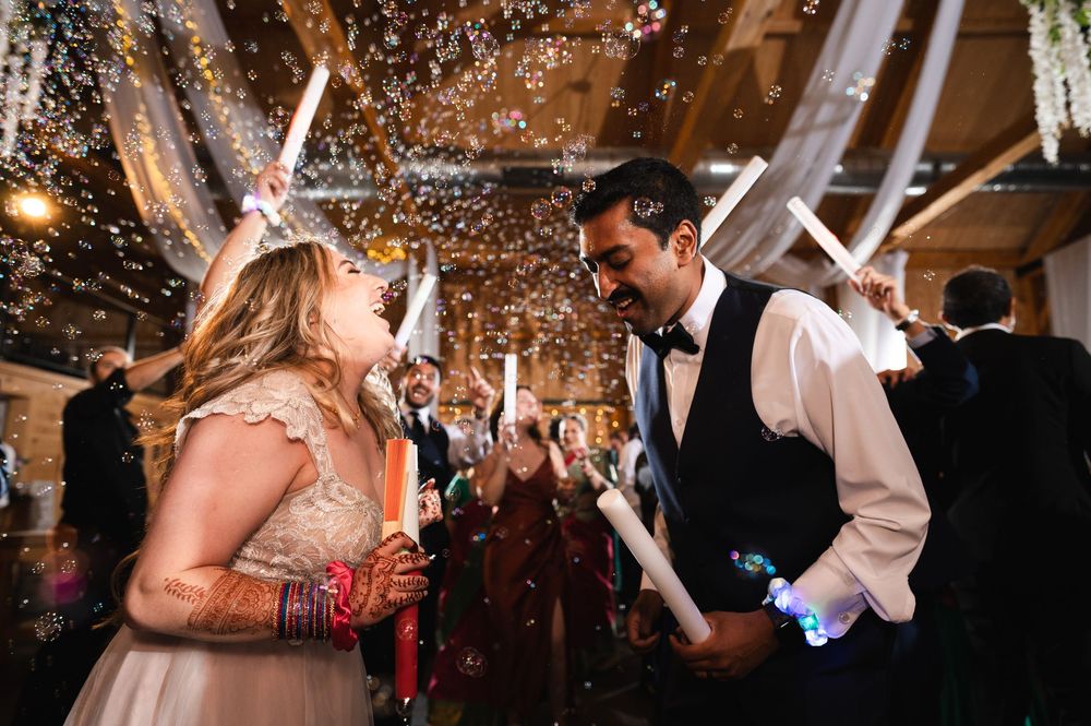 Bride and groom dancing during reception under indoor lights and bubbles at Fortune Valley Manor Saugerties, NY, Hudson Valley wedding.