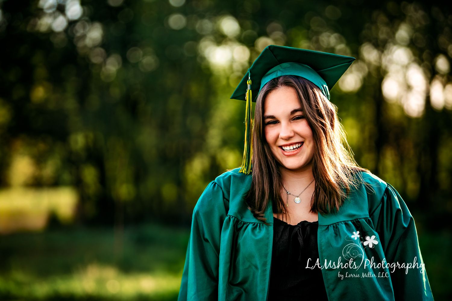 High School Senior Girl in graduation gown portrait