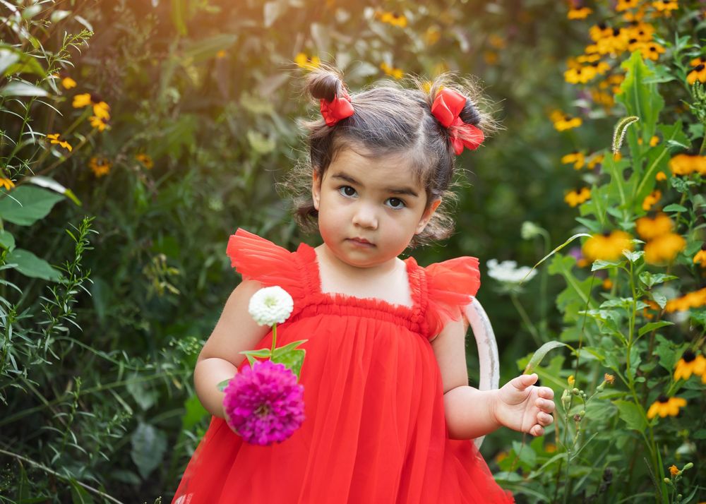 child in flower field detroit photography