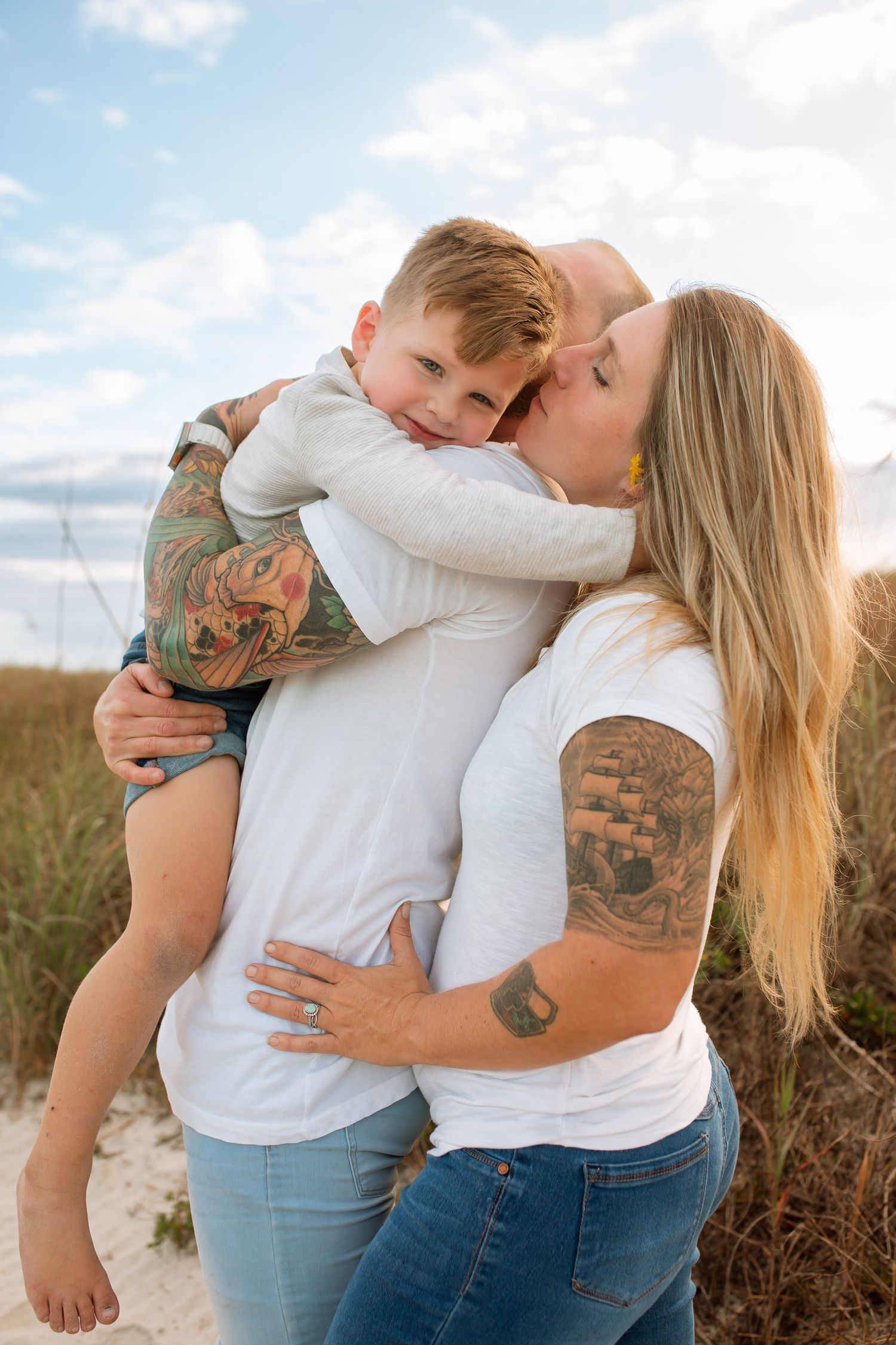 Smiling family poses for Brevard County photographer, Lux Viera Photography Cherished memories preserved by Brevard
