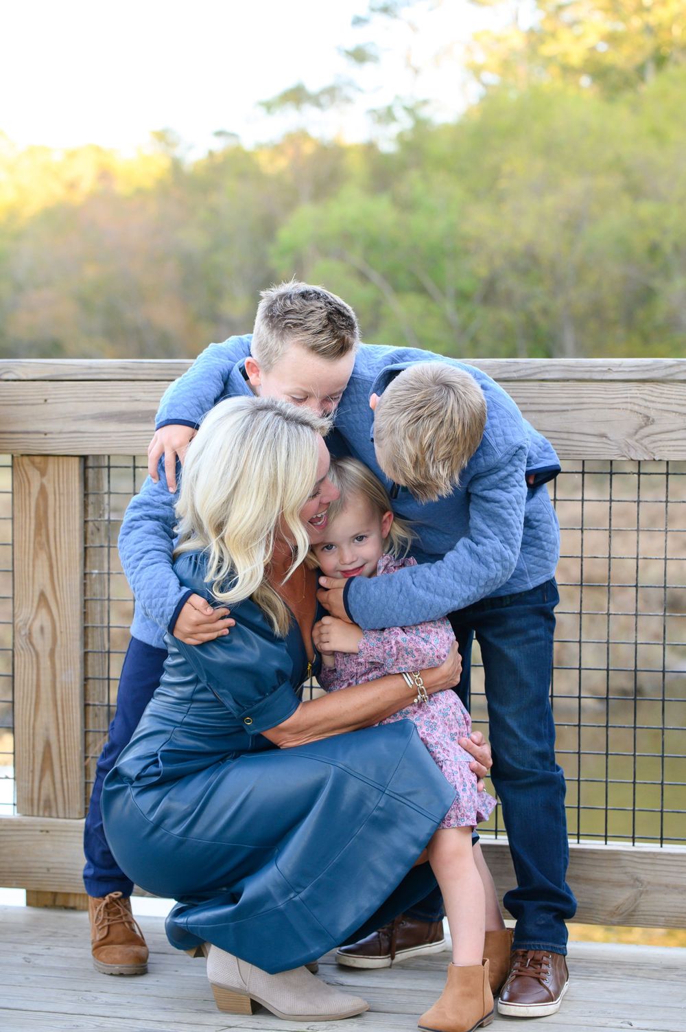 A sweet family moment captured in a series of four candid photos on a wooden deck during golden hour.