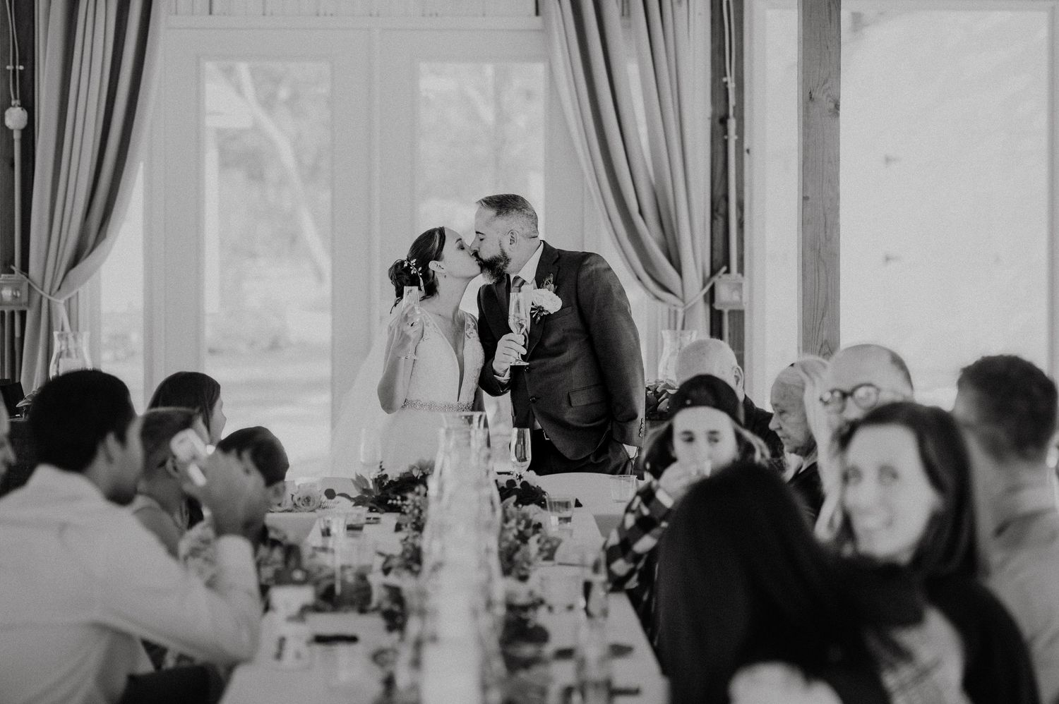 Bride and Groom sharing a kiss after toasting to their guest during an intimate reception.
Couples, Engagement, Weddings, Elopements
SC