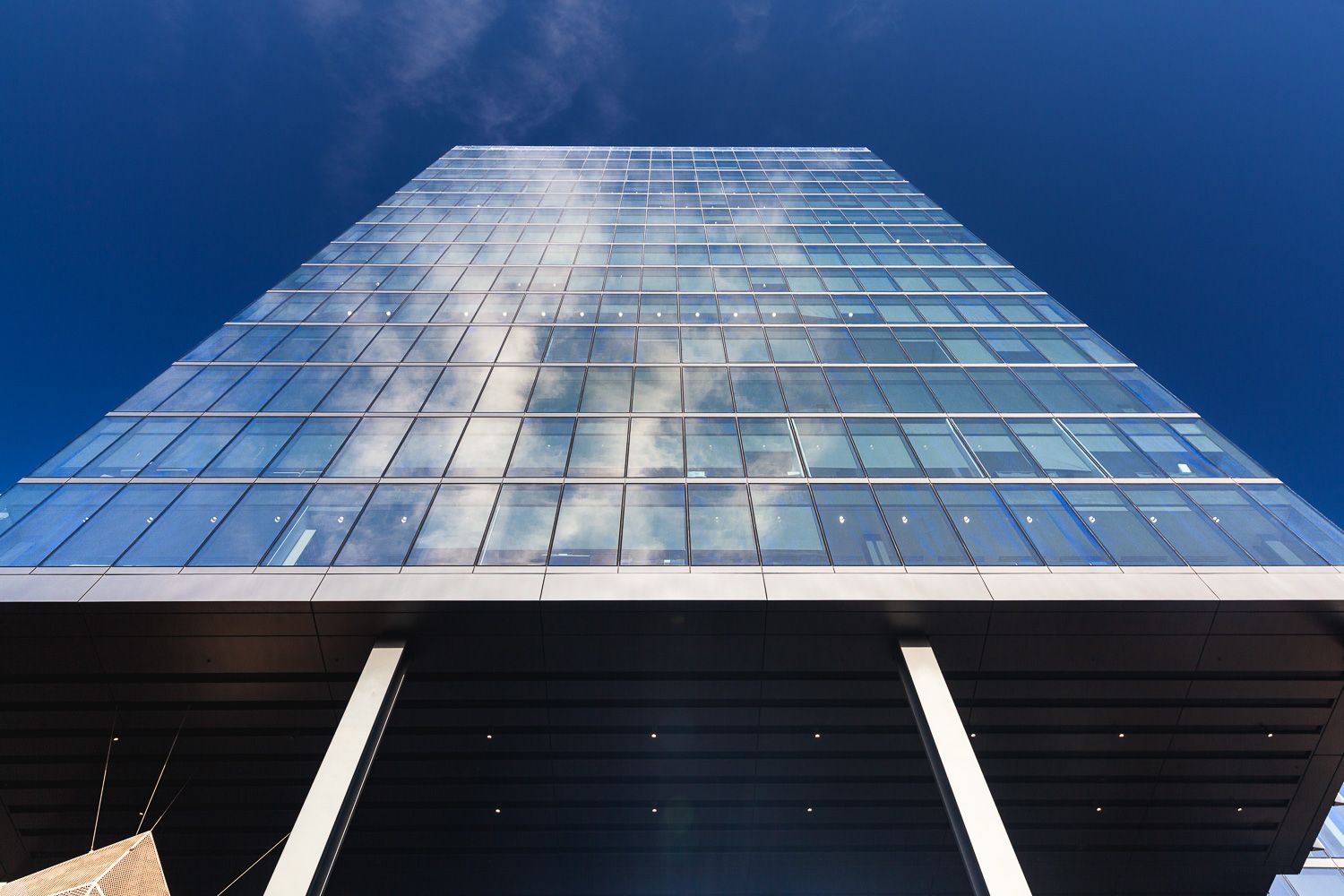 Glass façade and architectural details of 103 Colmore Row Birmingham