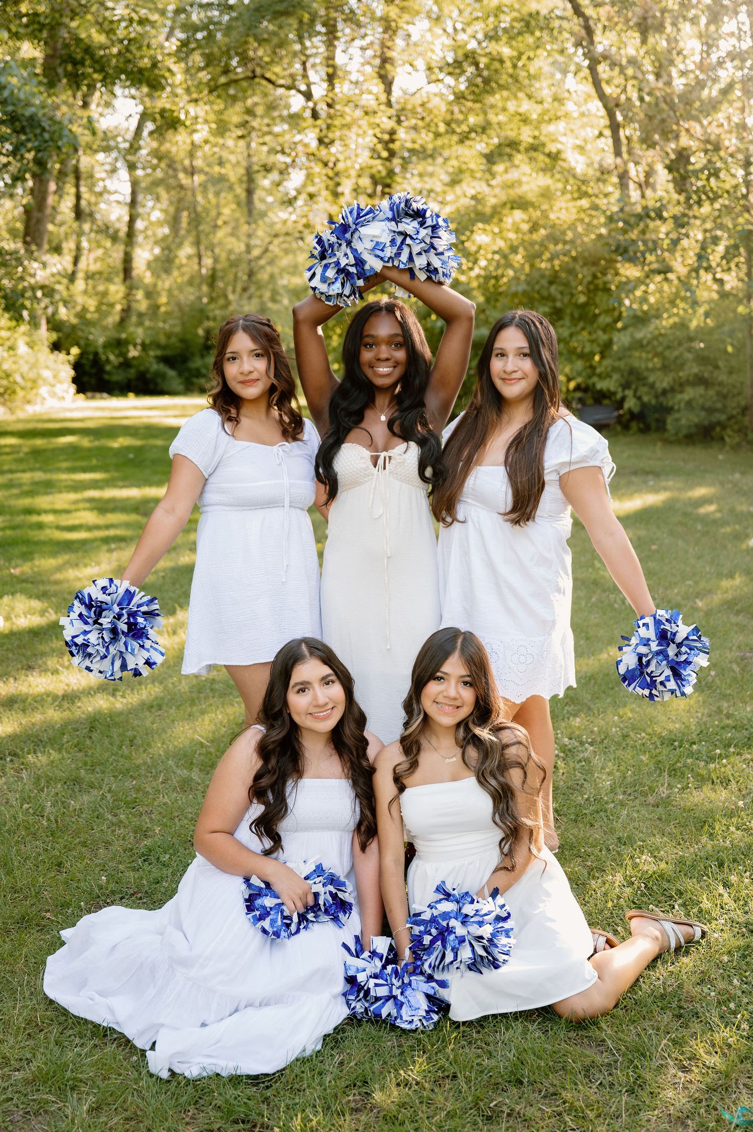 Walla Walla High School dance team photoshoot with blue and white pom poms and white dresses