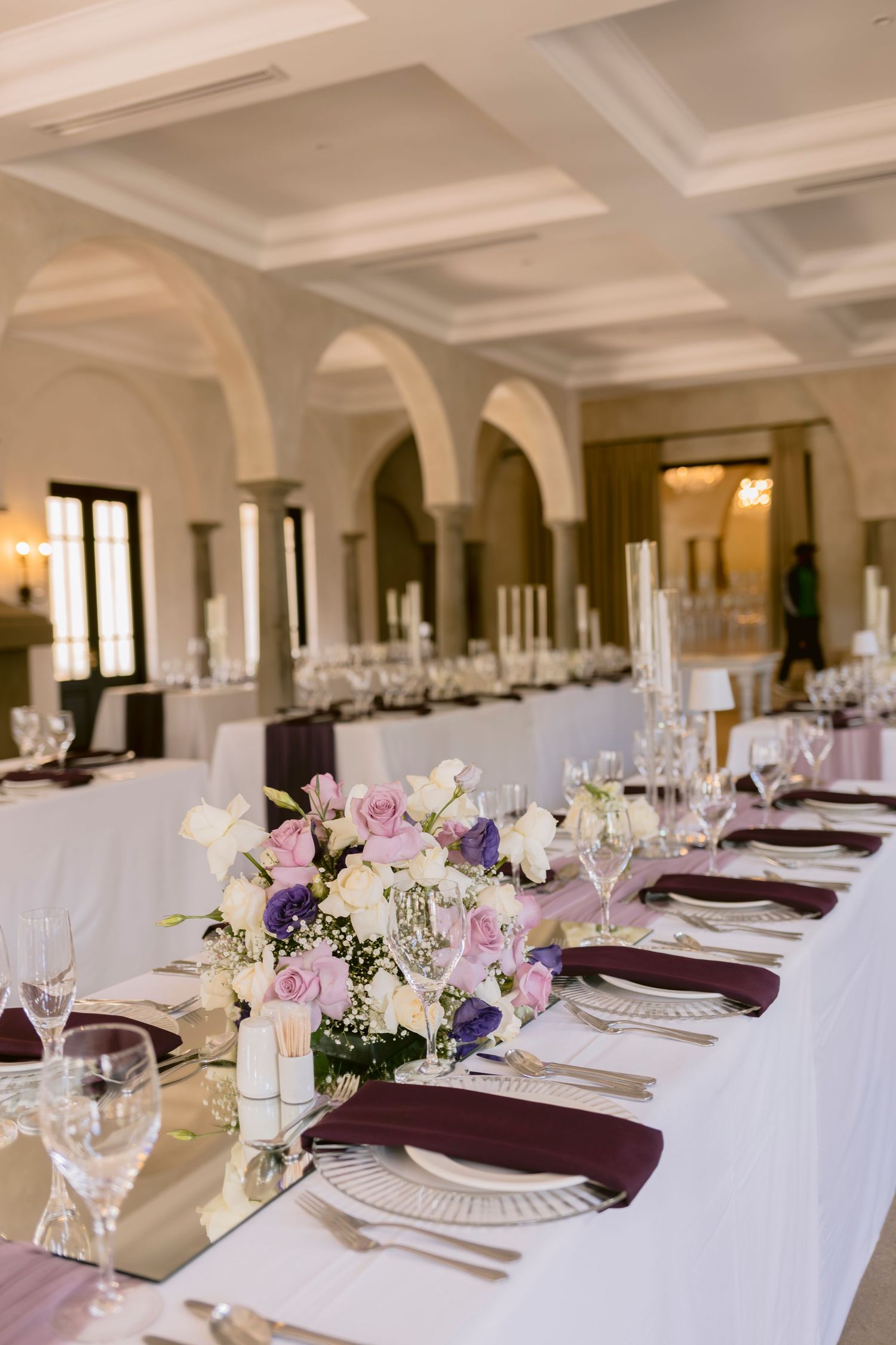 Reception venue interior featuring floral décor and personalised details.