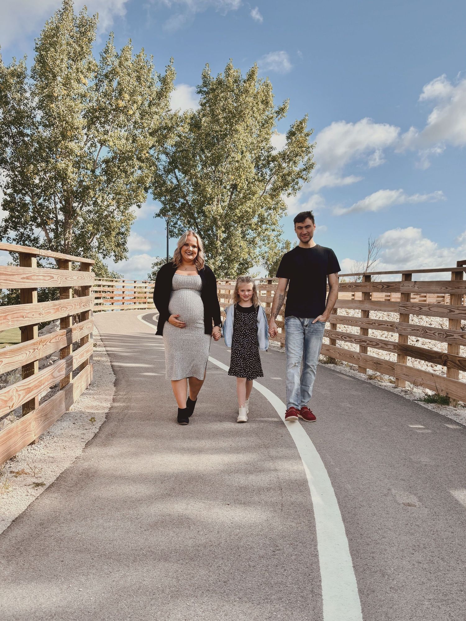 Family walking towards camera during family photography session