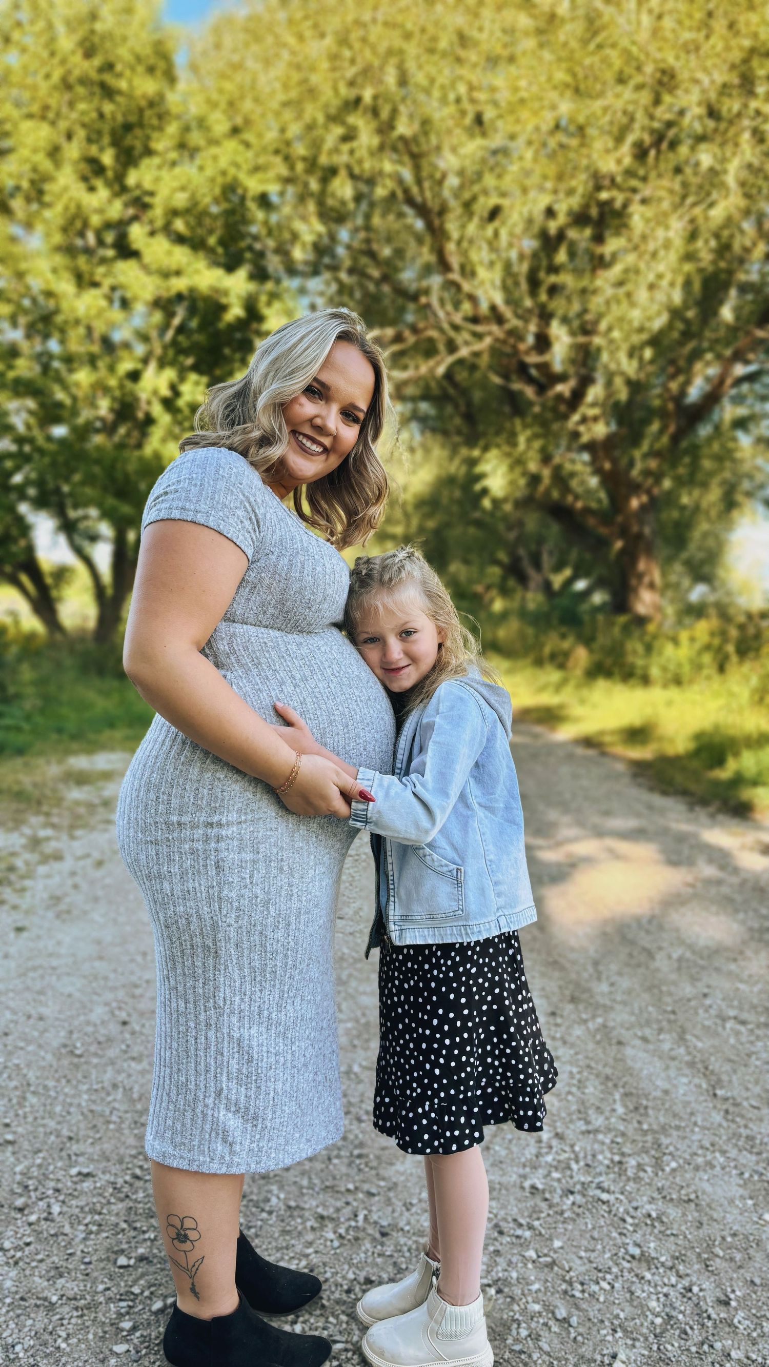 Mom and daughter smiling during family photography session