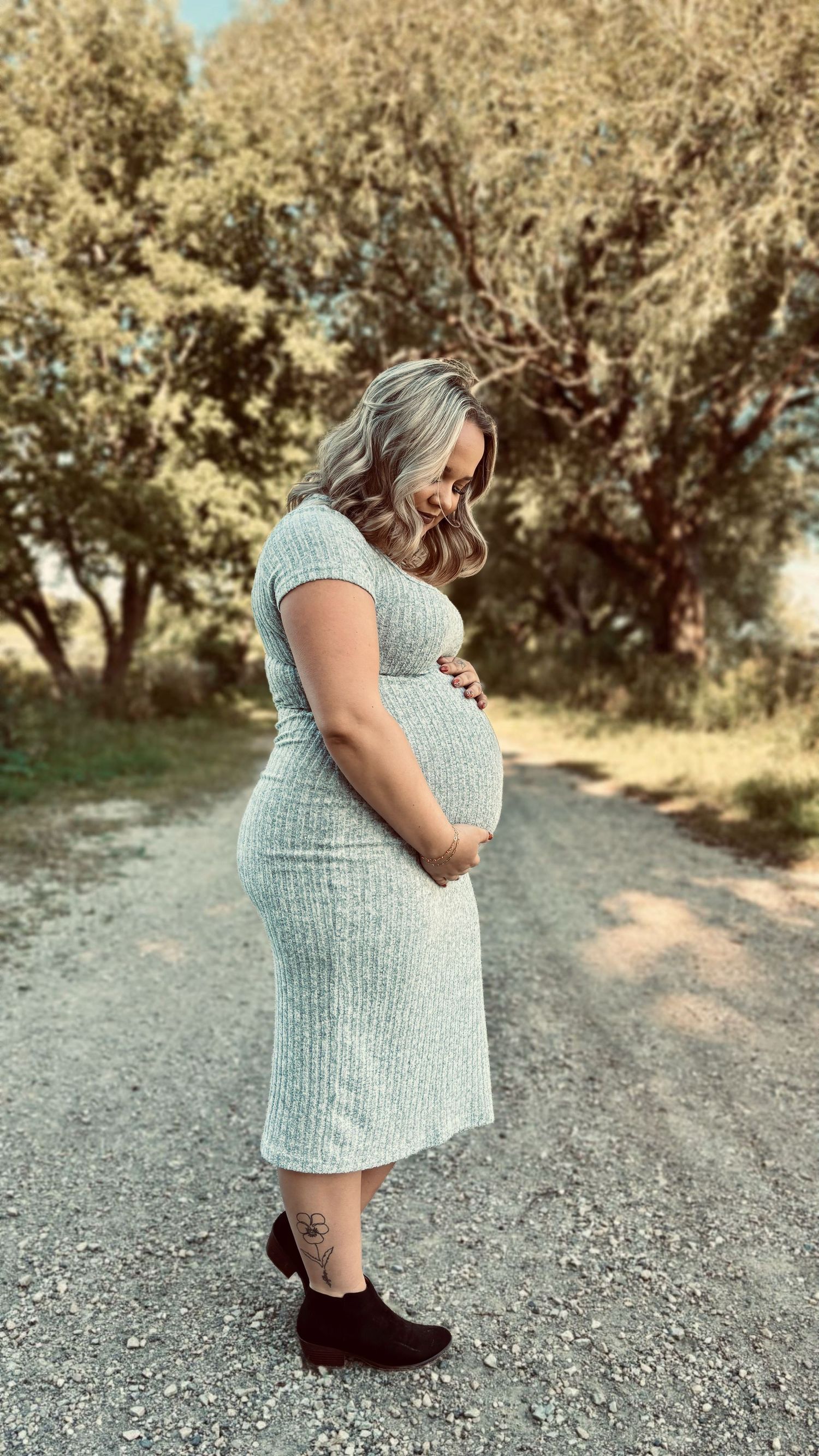 Expecting mother during maternity photography session.