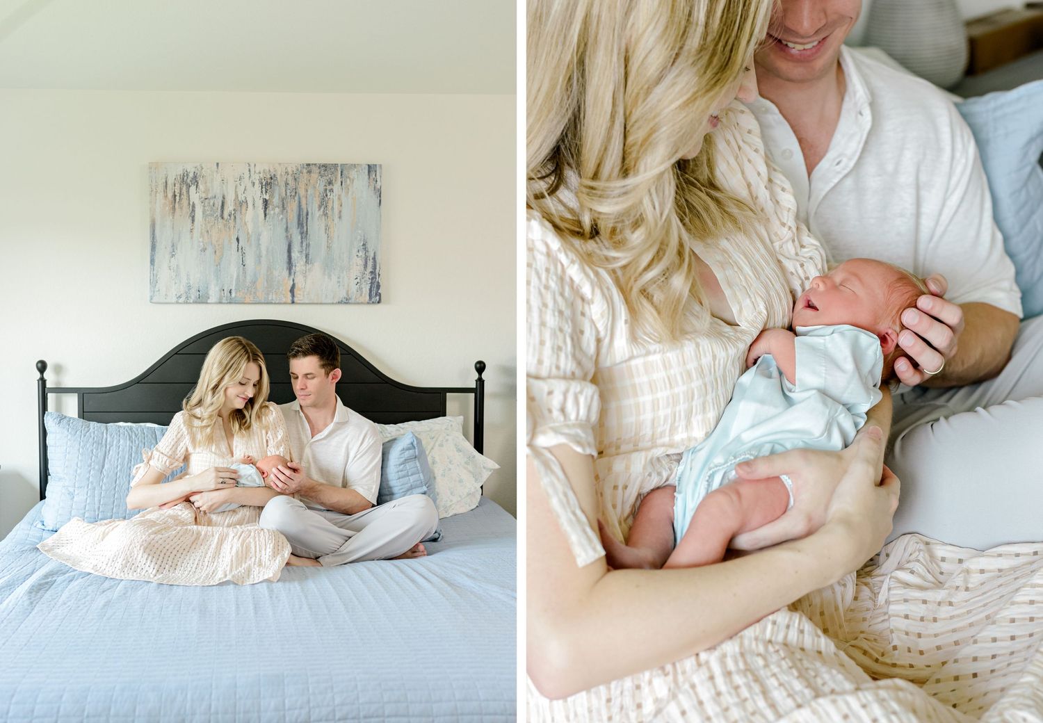 New parents sit on a bed cradling their newborn baby, with a soft abstract painting on the wall behind them.