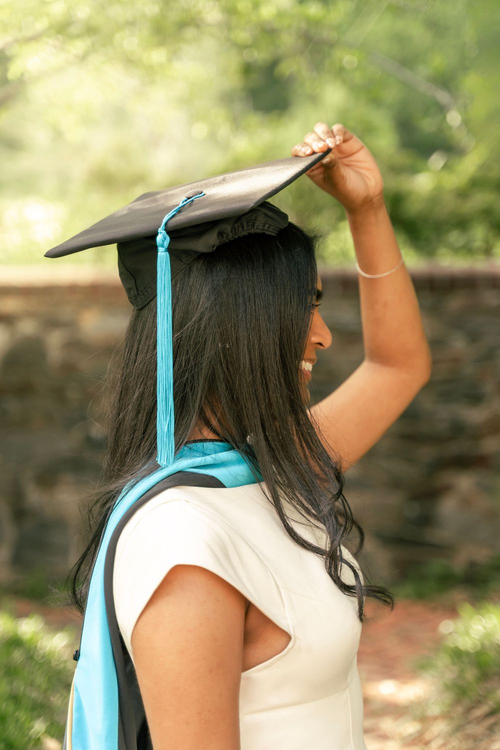 Johns Hopkins graduate student wearing her graduation cap and tassel