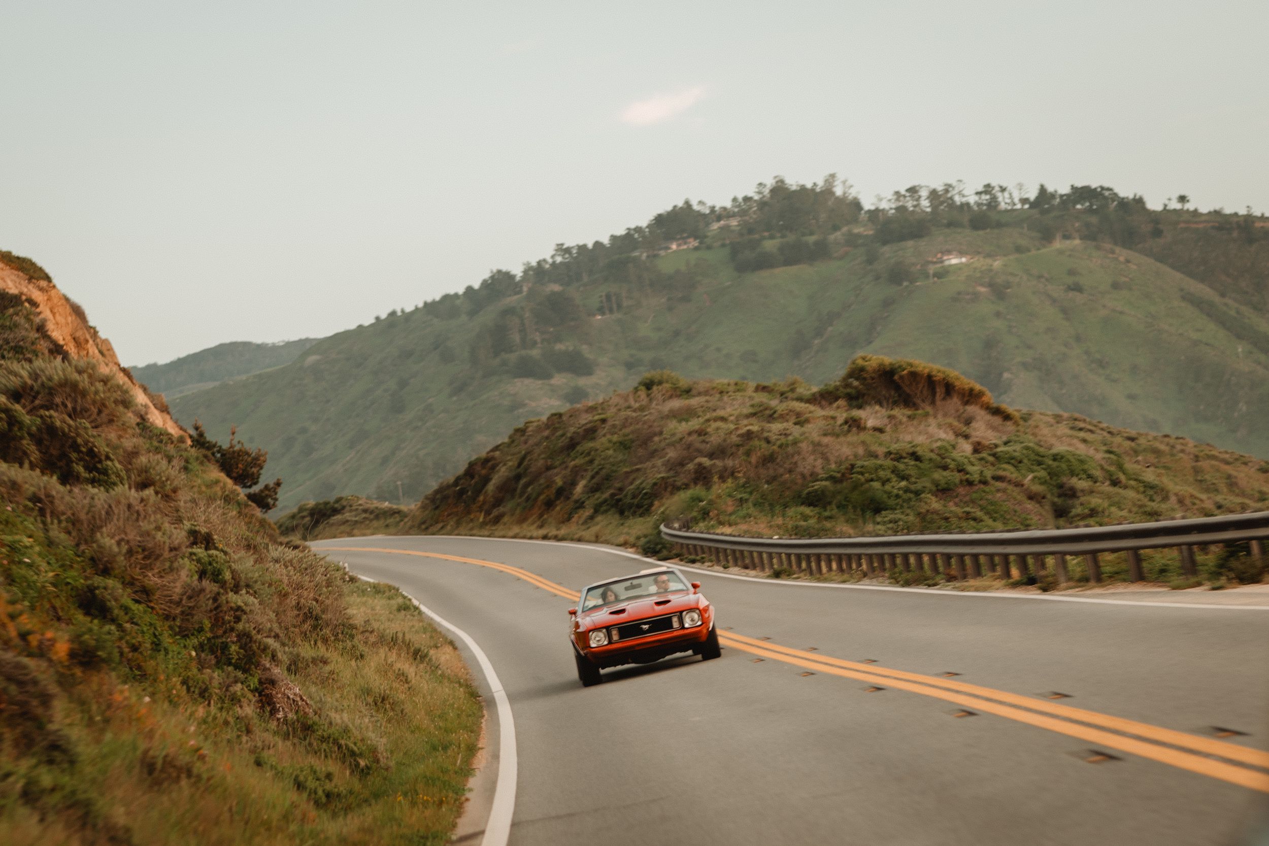 anniversary photos in big sur with a classic car