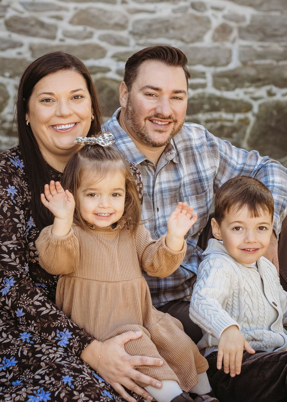 Parents with their two young children during a South Jersey family portrait session.