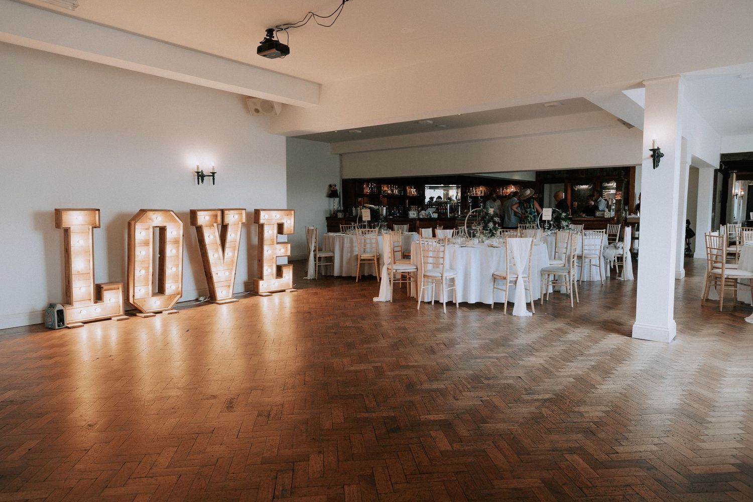 Cromwell Manor Reception Room Setup Parquet Floor Rustic Illuminated LOVE Letters