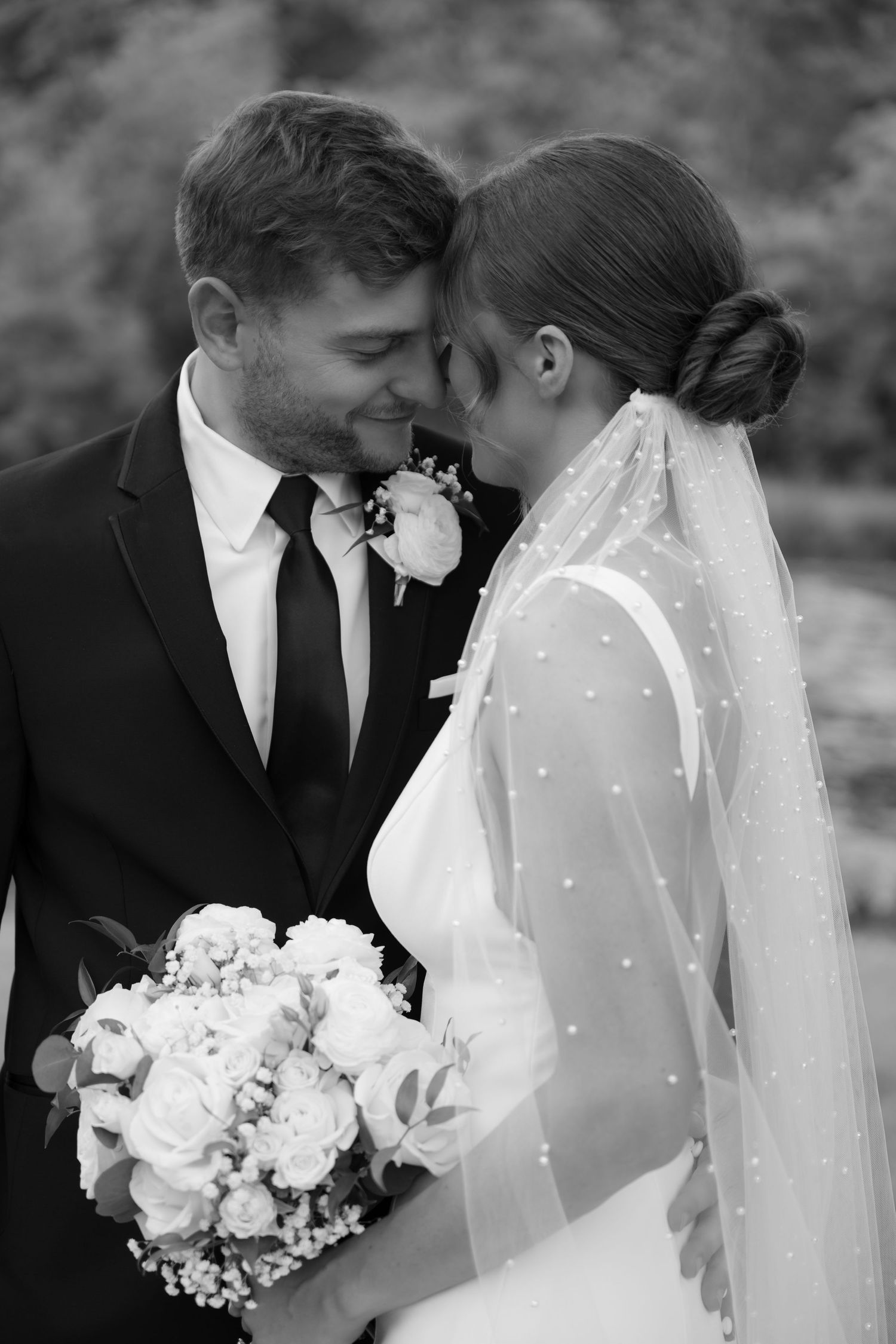 Bride & Groom have a moment of silence together after their first look at La Pointe Events in Somerset, WI.