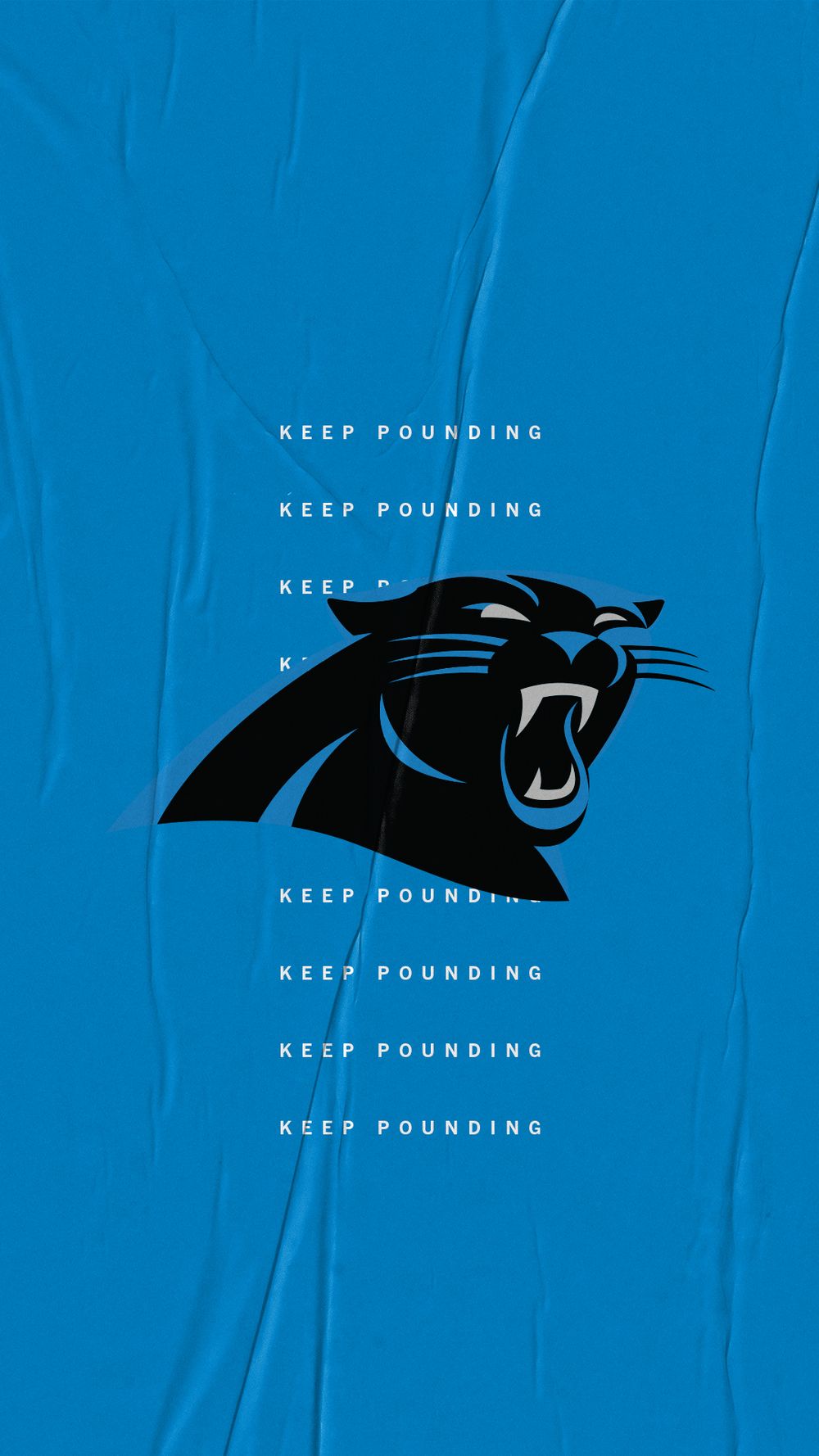 Carolina Panthers Keep Pounding blue wallpaper featuring the iconic black panther logo on a crinkled blue background.