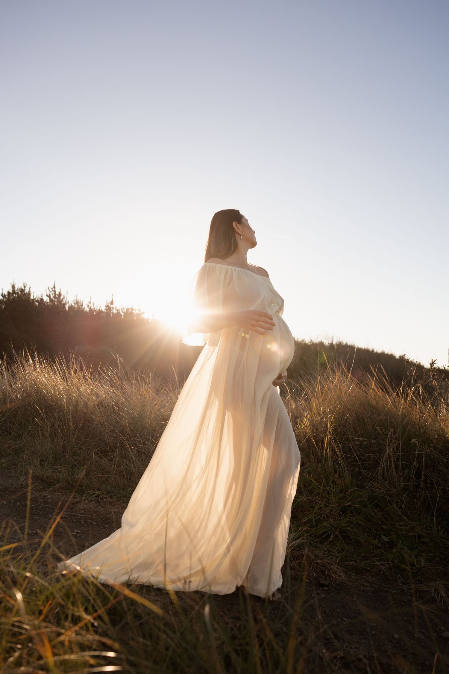 Solo sunset maternity session at Waimari beach, christchurch