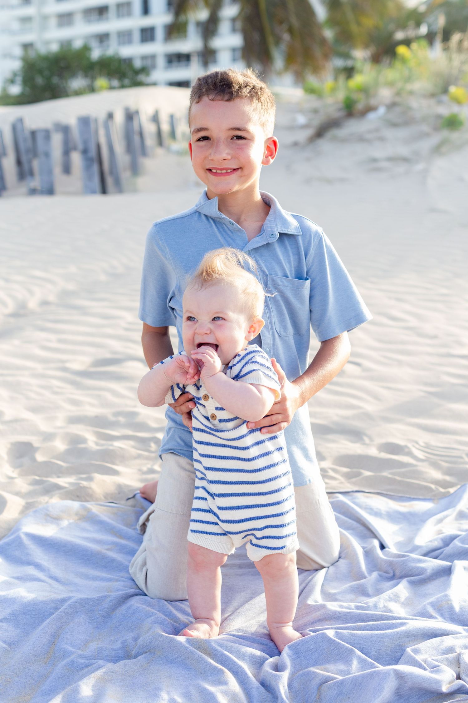 Portrait of two boys on the beach in Isla Verde, Carolina, Puerto Rico.