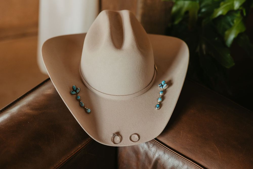 Stetson Cowboy hat for Bride on her Western Wedding Day Captured by Pray Montana Wedding Photographer with her Turquoise