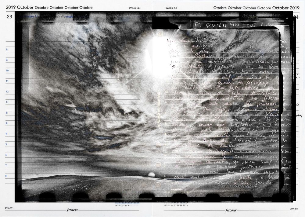 A dramatic black and white calendar page featuring stormy clouds and bright light with overlaid text for October 2019.