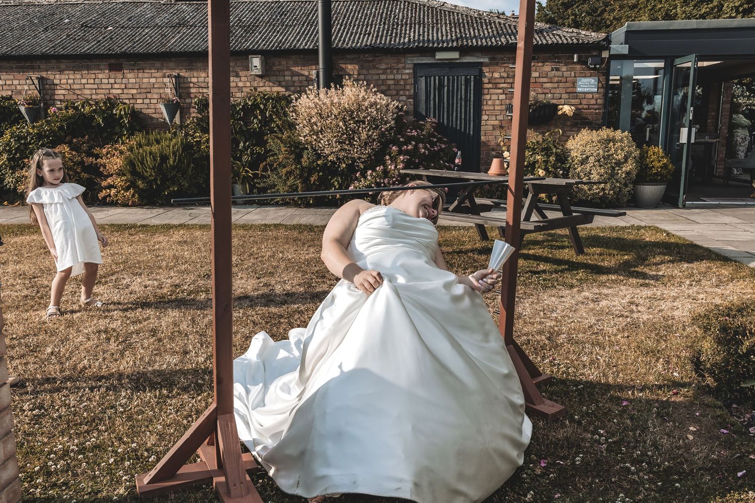 A fun documentary moment bride limbos at her wedding day