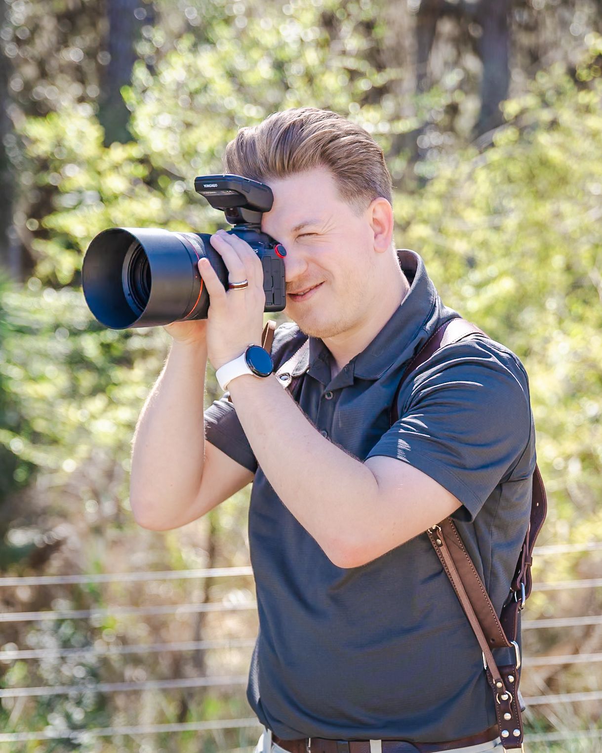 Photographer behind the lens at Spark Over Georgia in South Georgia.