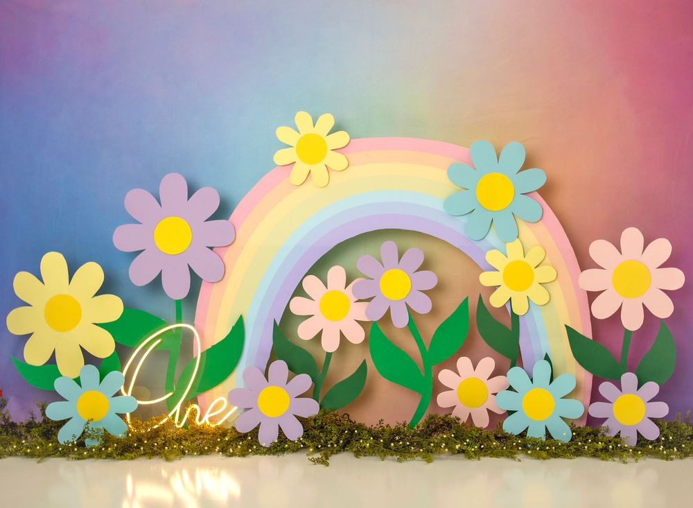 A colorful banner with daisy flowers and a rainbow gradient background creates a cheerful spring-themed design.