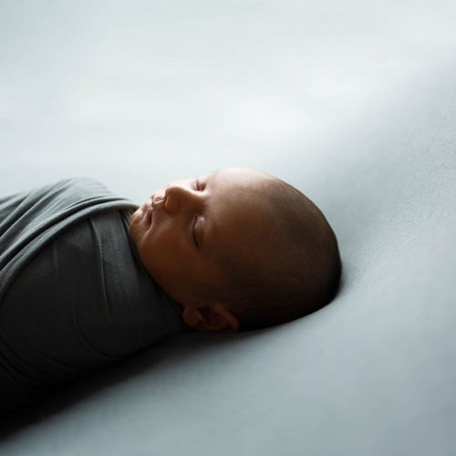 A sequence of images showing a person lying down with increasingly dark lighting and shadows.